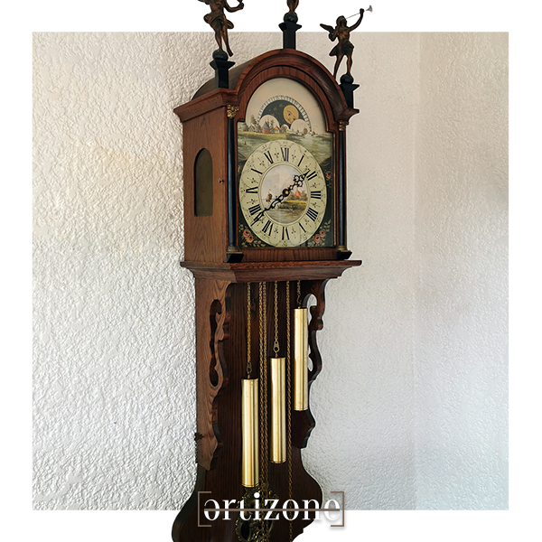 Frisian tail vintage clock