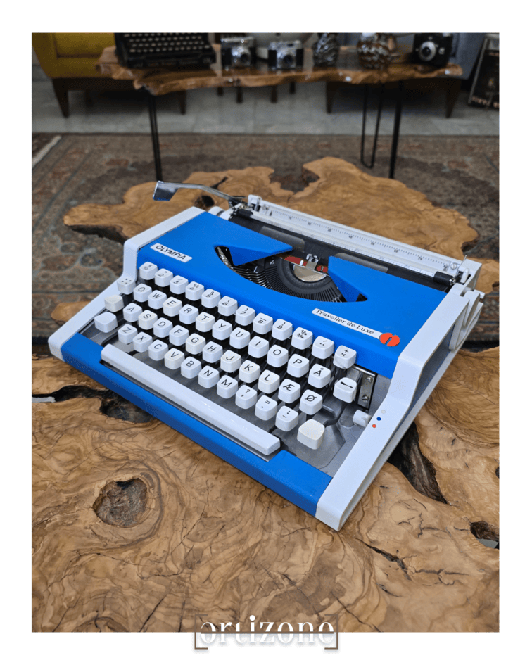 Vintage Blue Olympia Traveller De Luxe Typewriter