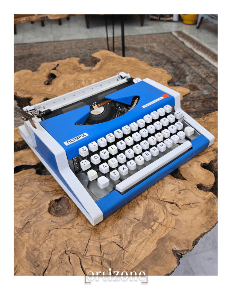 Vintage Blue Olympia Traveller De Luxe Typewriter