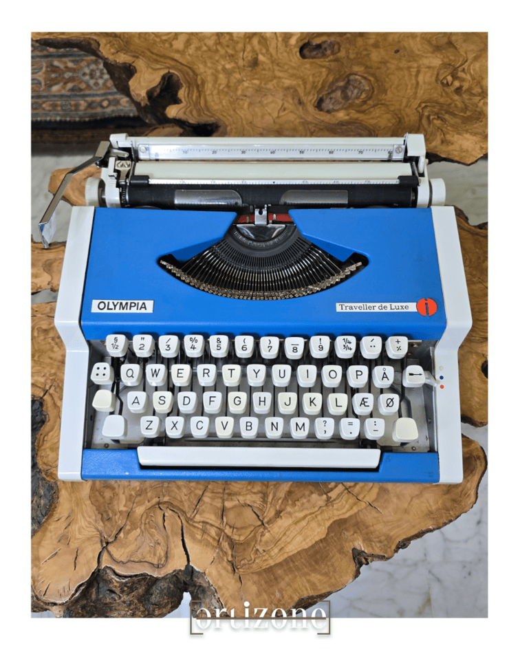 Vintage Blue Olympia Traveller De Luxe Typewriter