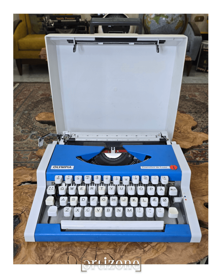 Vintage Blue Olympia Traveller De Luxe Typewriter