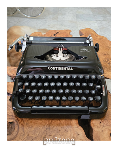 Continental Typewriter (نجار)
