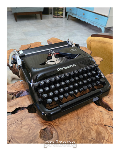 Continental Typewriter (نجار)