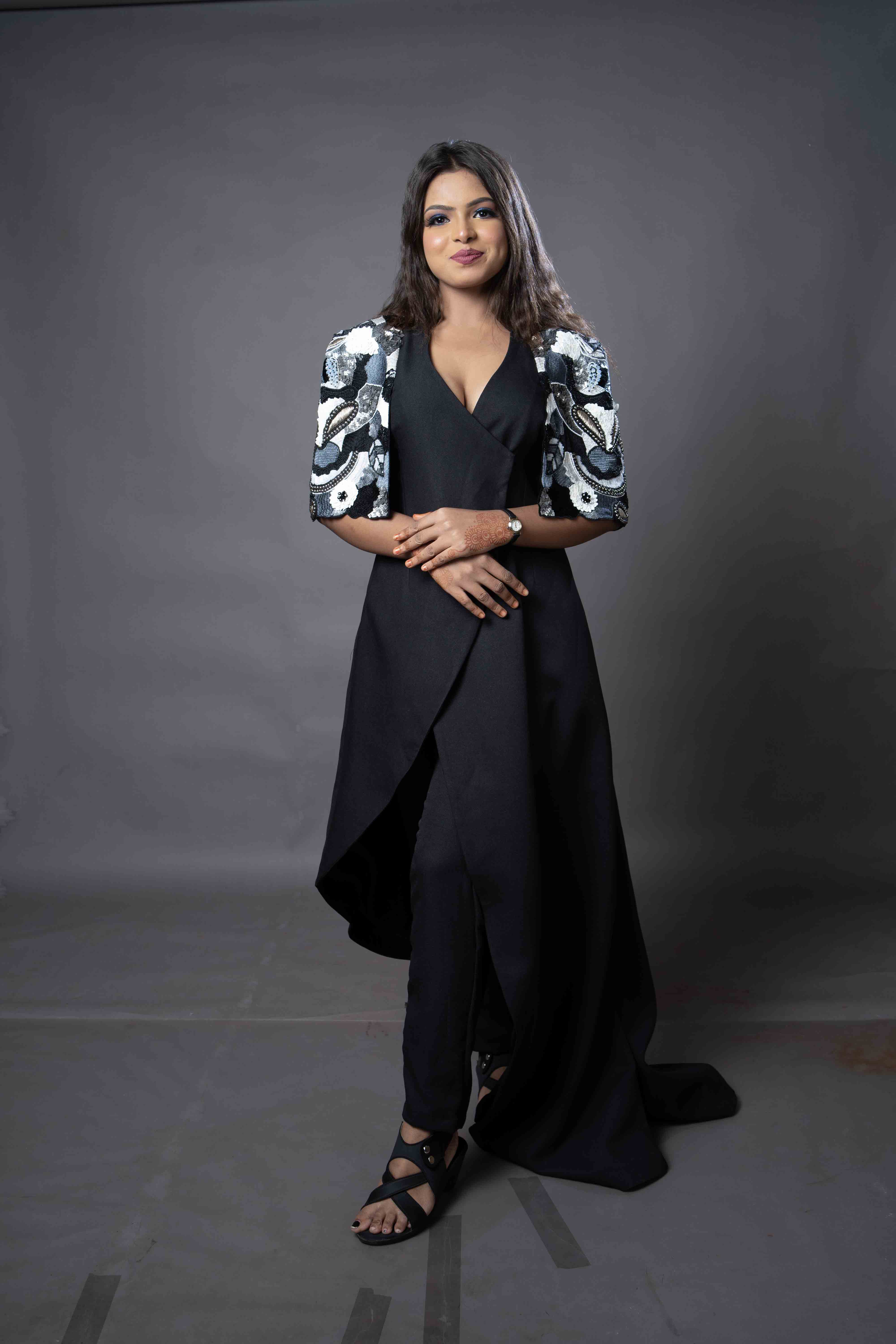 Black dress with design on shoulder 