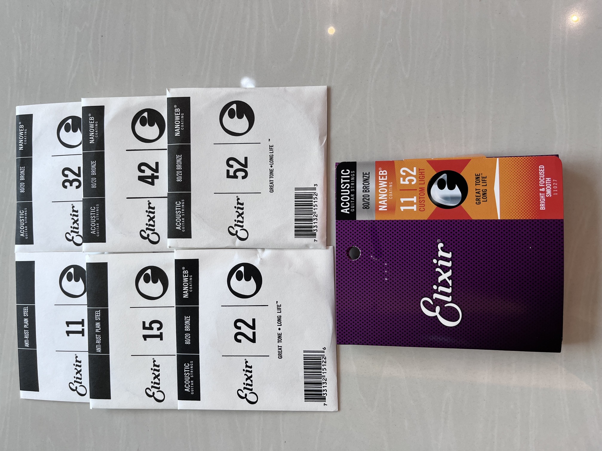 Elixir Strings Phosphor Bronze Acoustic Guitar Strings w NANOWEB Coating Custom Light (.011-.052)