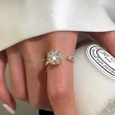 Radiant Spin: Rhinestone Gold Inlaid Rotating Spinner Finger Ring for Girls/Women