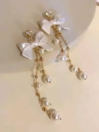 Graceful Harmony: Korean White Bow Shaped with Pearl Hangings