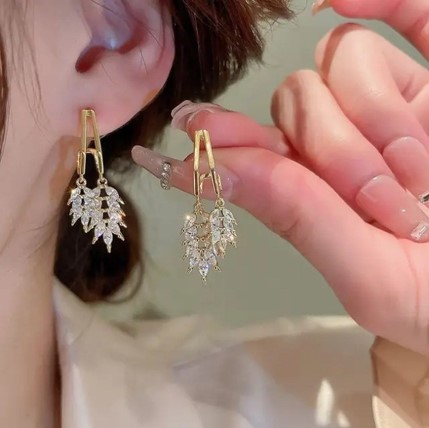 Gilded Foliage: Crystal Leaf Shaped Golden Earrings