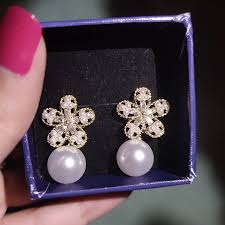 Artisanal Bloom: Alloy Fashion Golden Flower Handcrafted Earrings