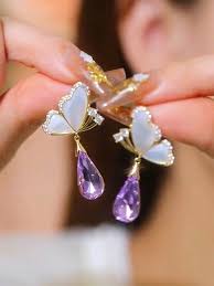 Royal Radiance: Alloy Latest Purple Crystal Butterfly Earrings
