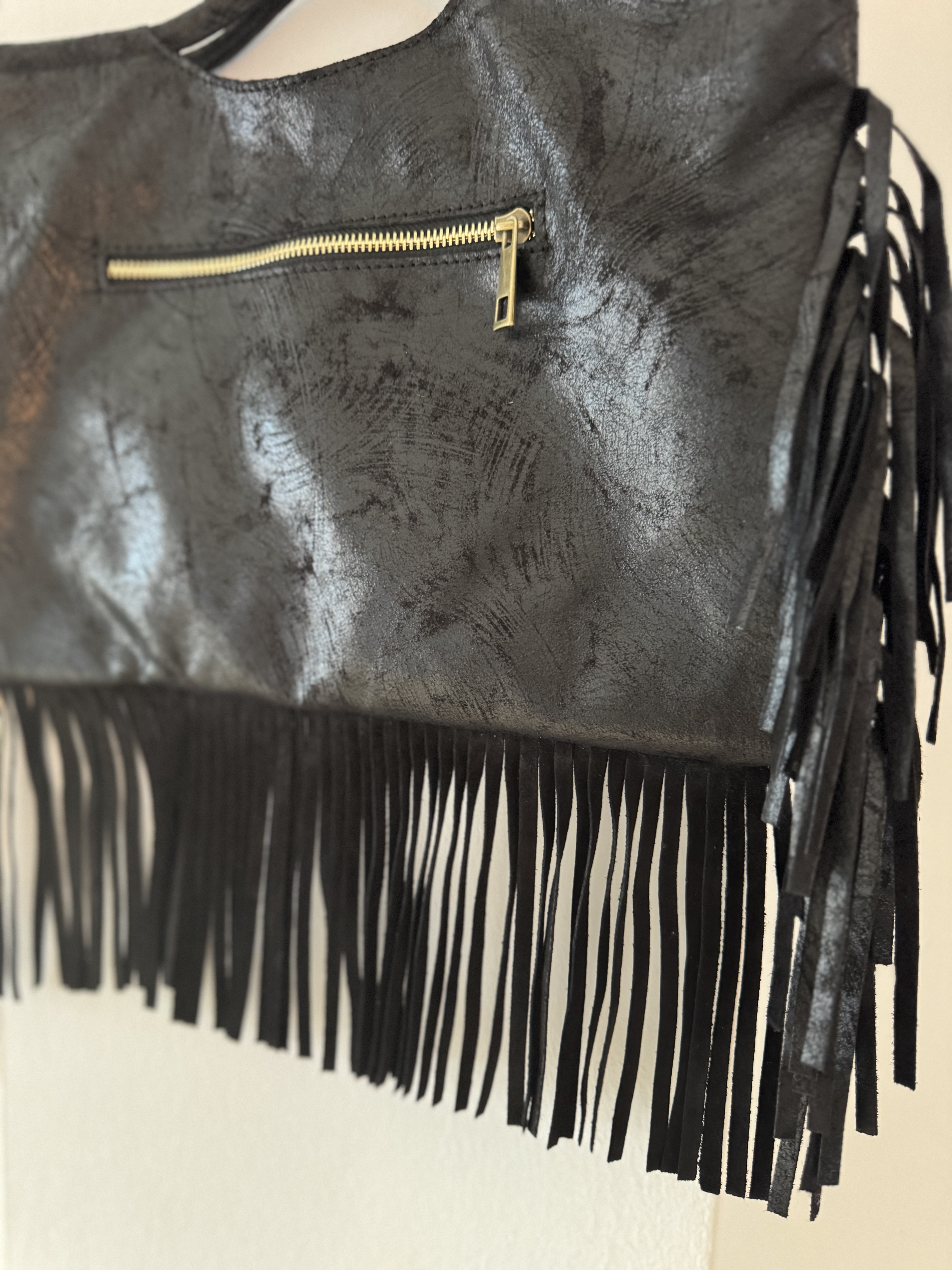 Bolso piel flecos