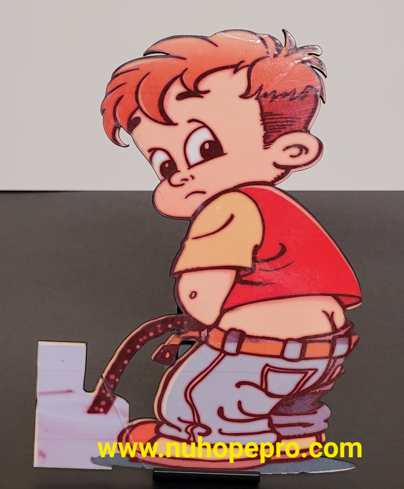 A Pee Boy Cartoon Character Standee