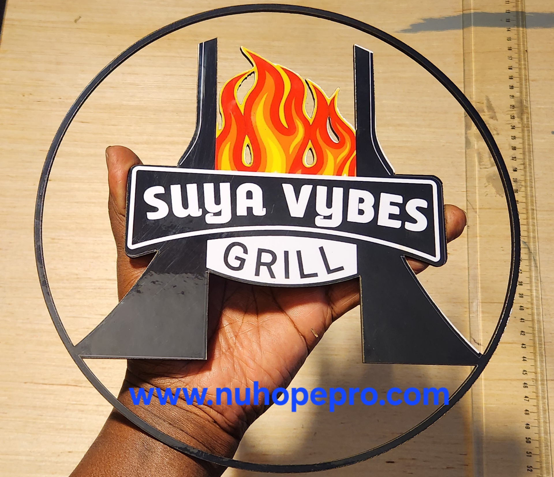 Suya Vybes Grill Sign