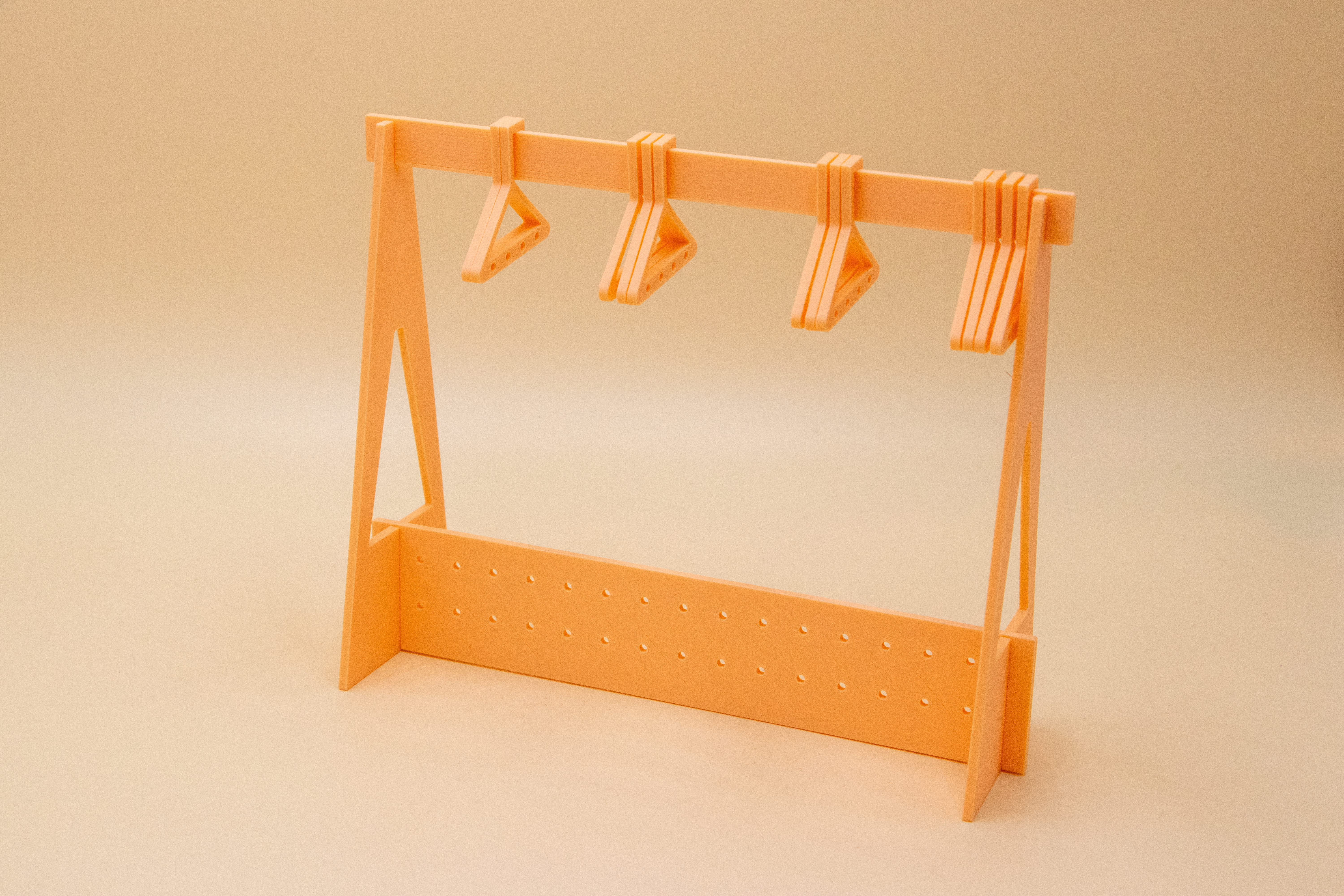 Portant pour boucles d'oreilles, avec cintres