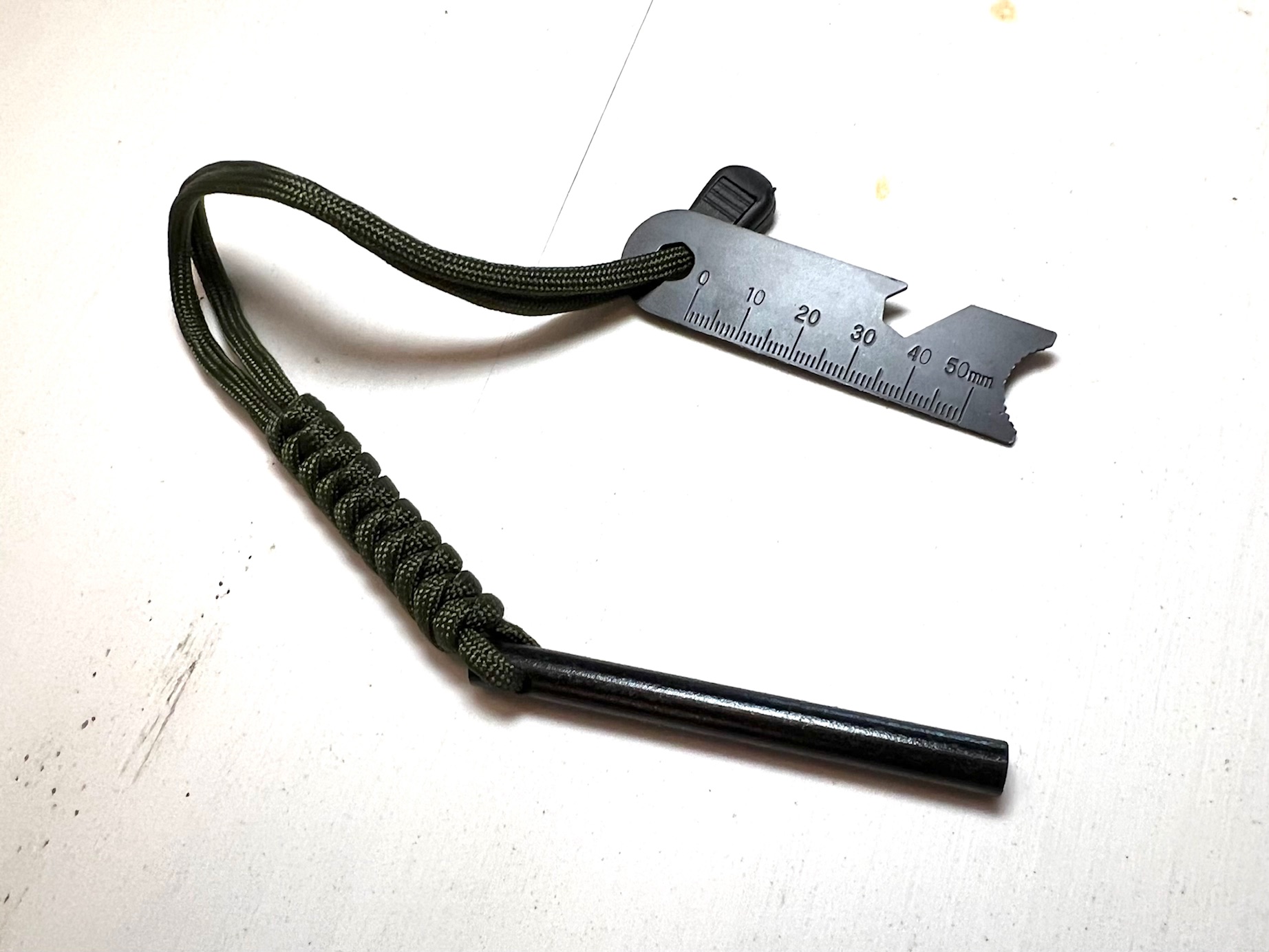 3” Ferro Rod with 550 Paracord Handle with Lanyard and Multi-tool Striker.