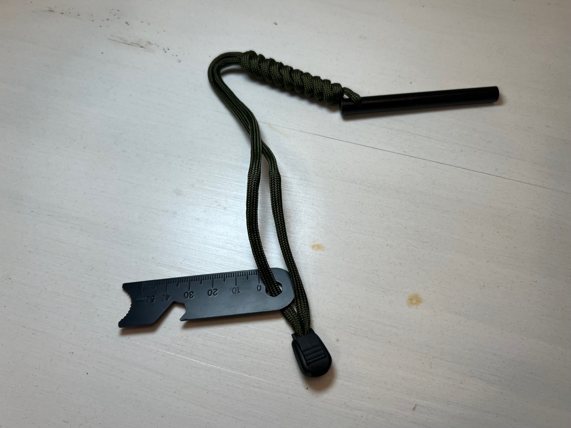 3” Ferro Rod with 550 Paracord Handle with Lanyard and Multi-tool Striker.