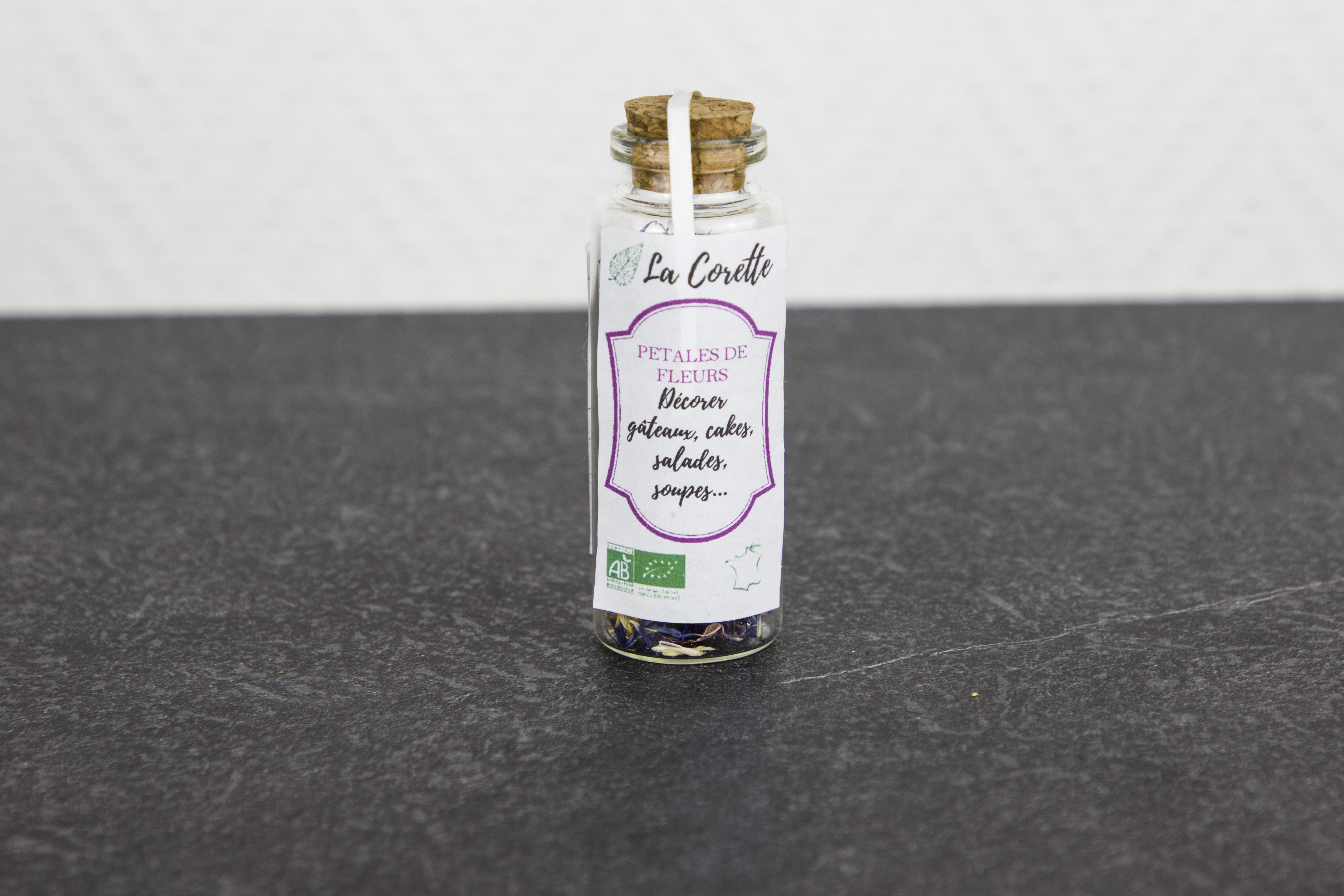 Fiole de pétales de fleurs comestibles