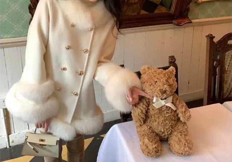 Elegant White Fur-Trimmed Coat