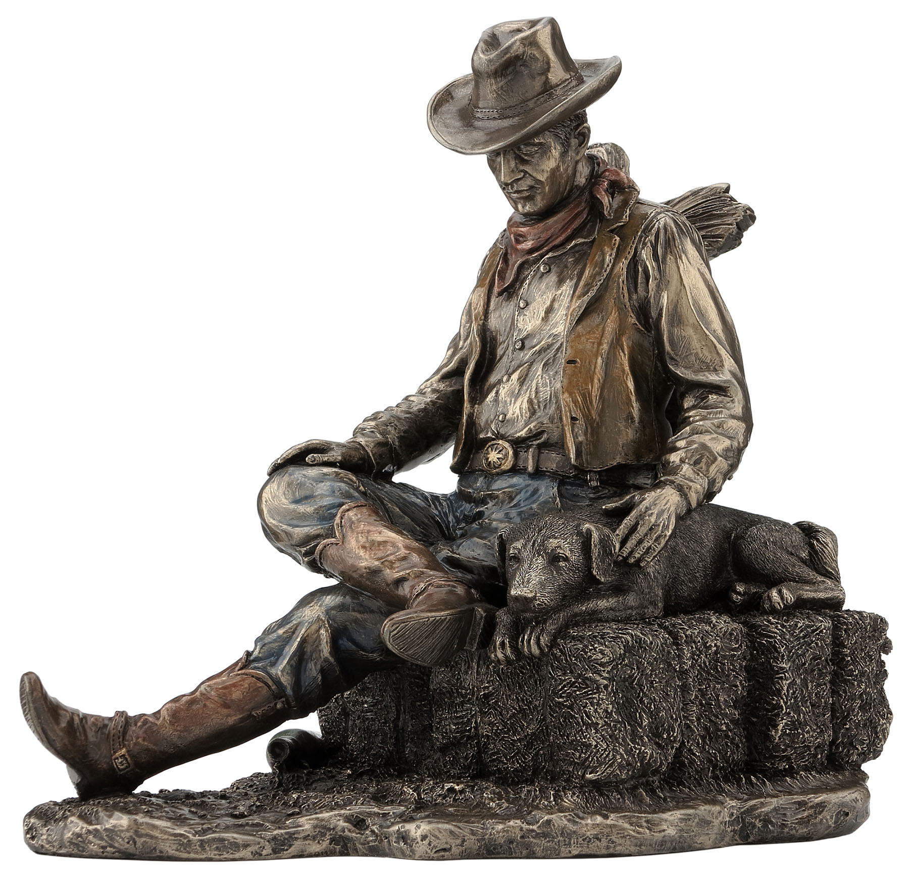 COWBOY AND DOG NAPPING ON A BALE OF HAY