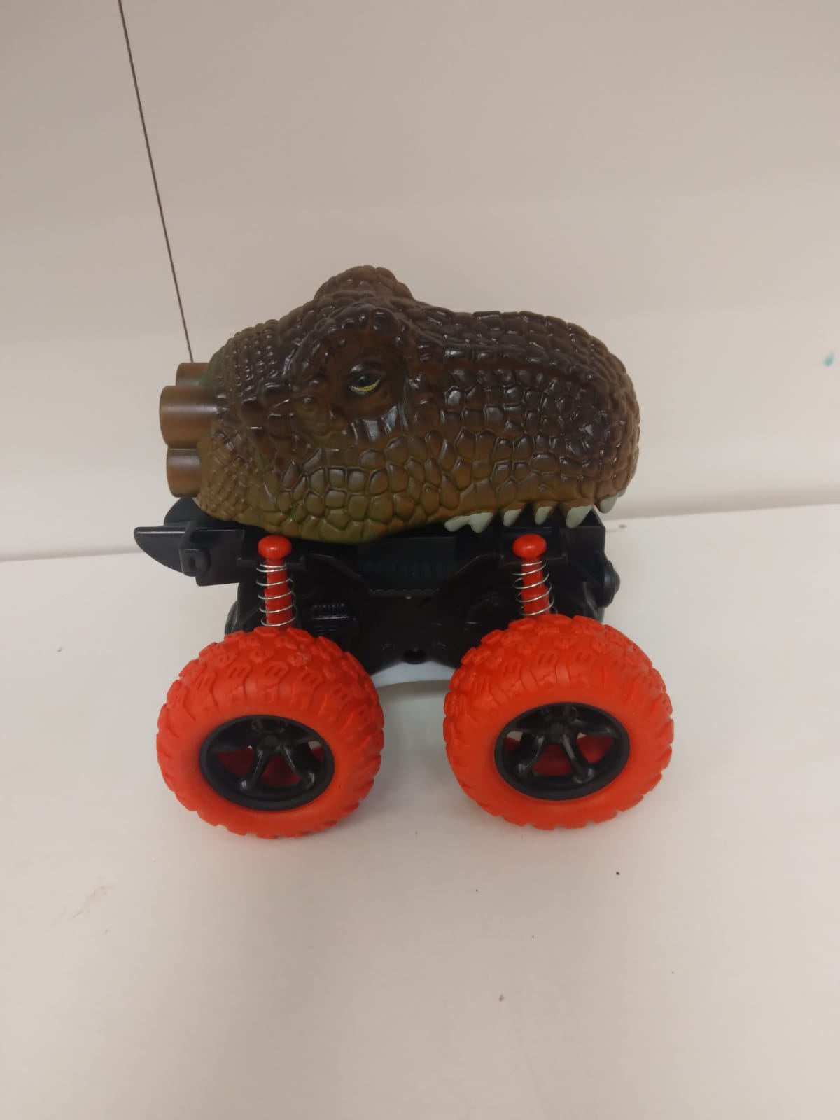 Dinosaur Head Monster Truck Toy