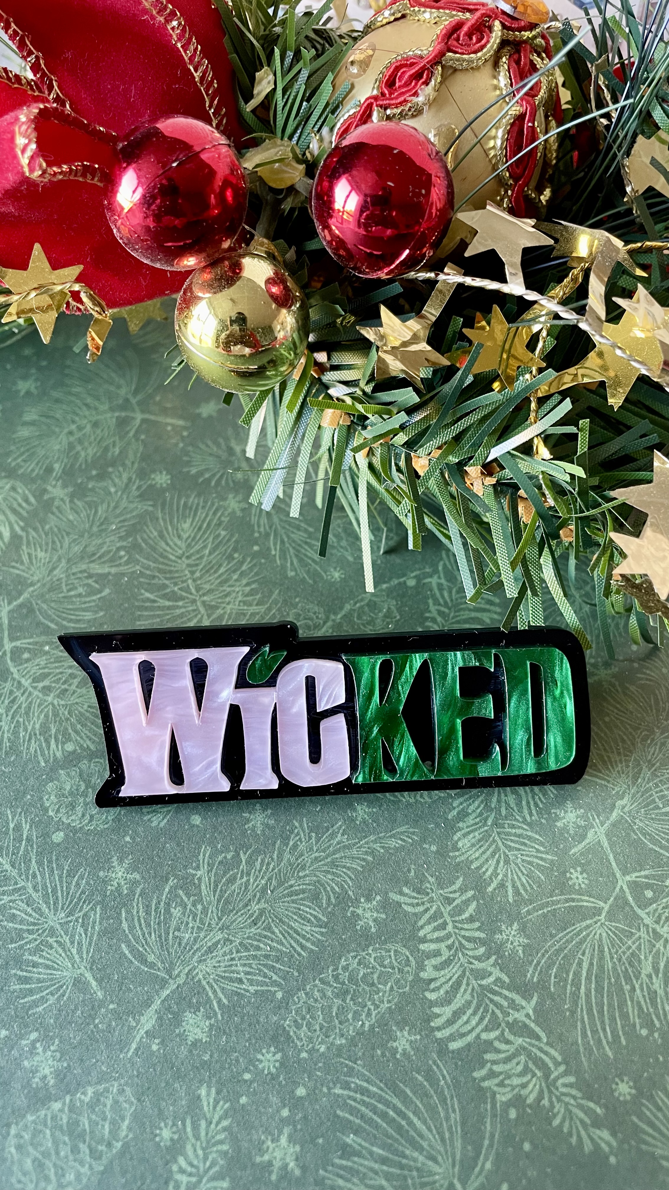 Wicked logo relief, non officiel