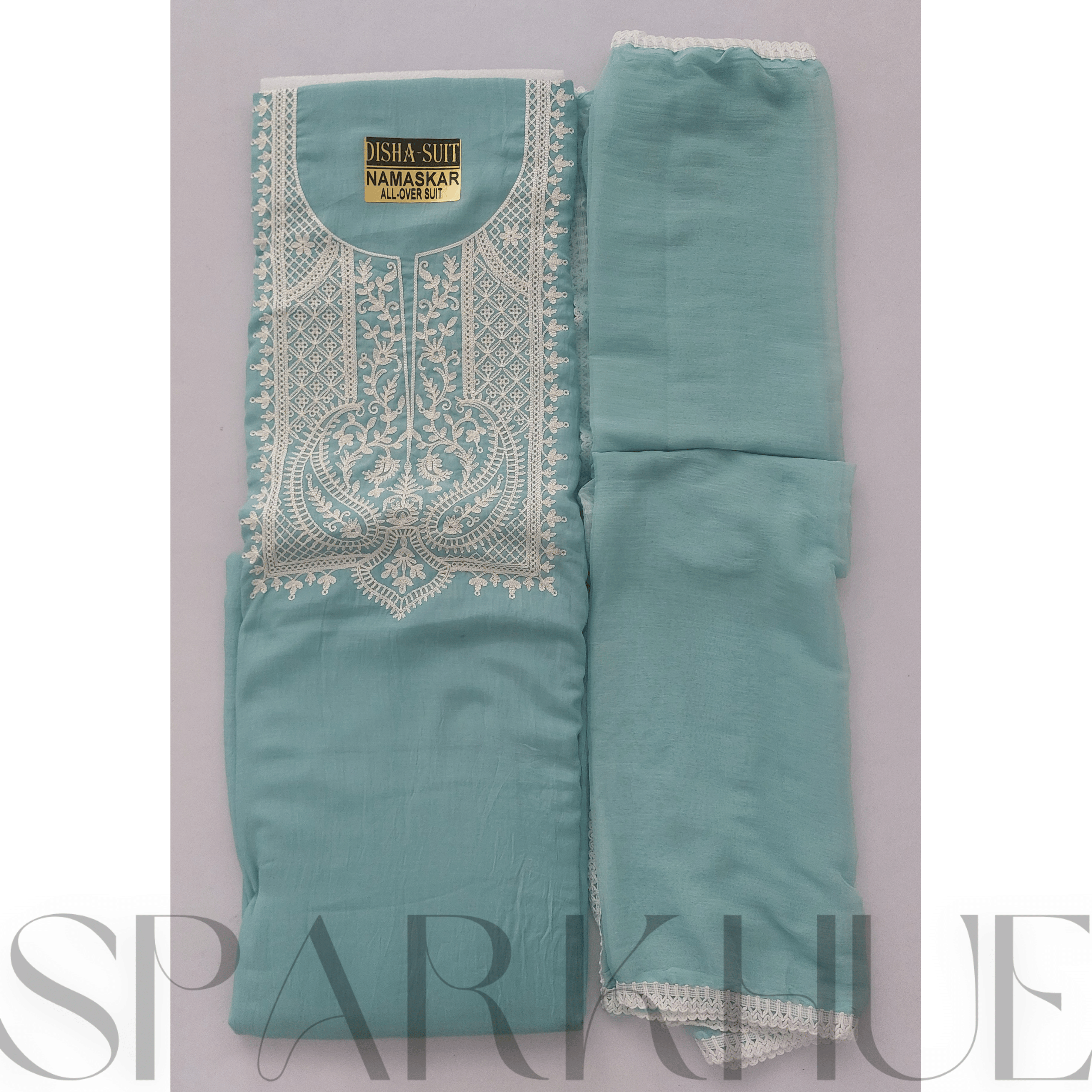 Unstitched designer embroidered suits
