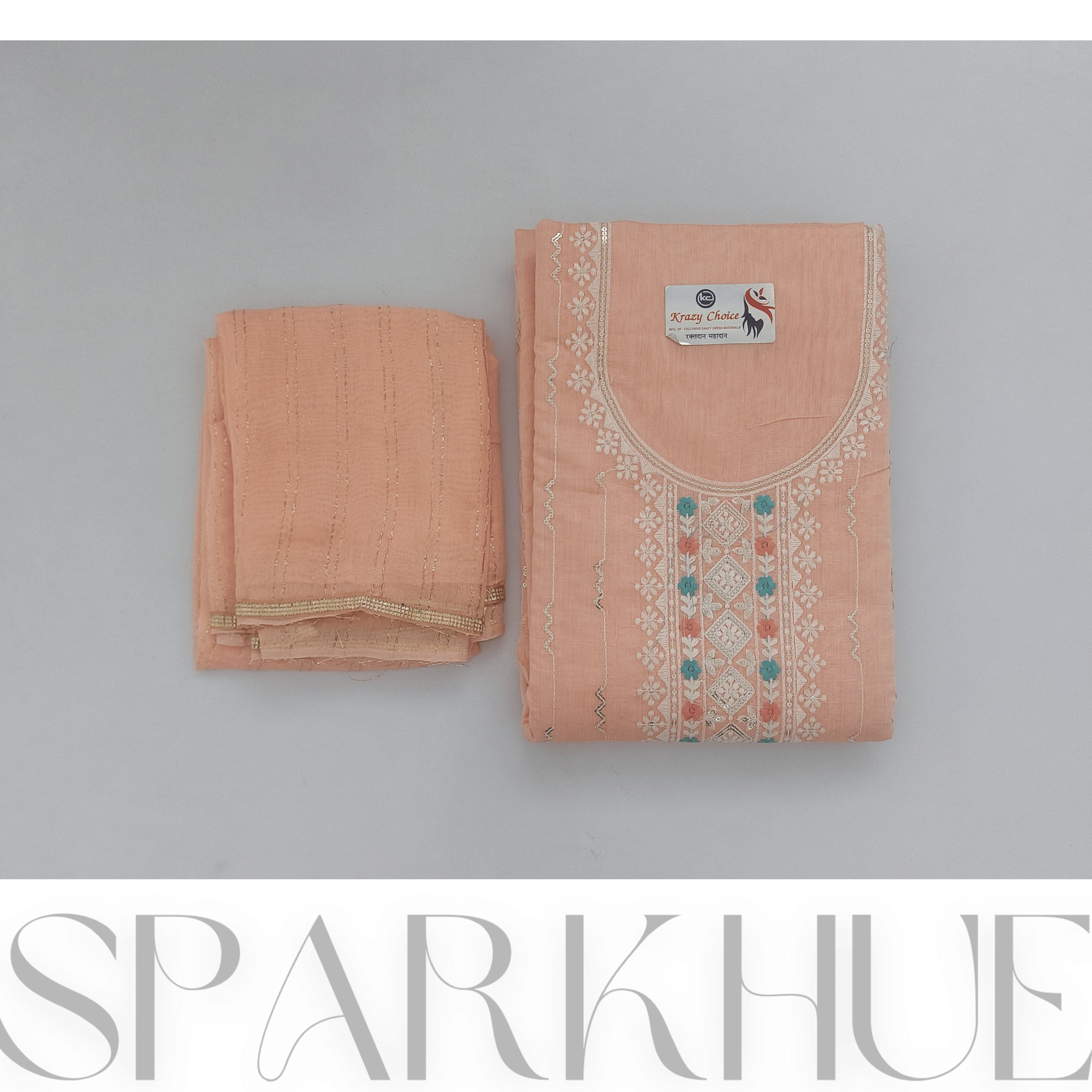   Unstitched embroidered peach kurta set