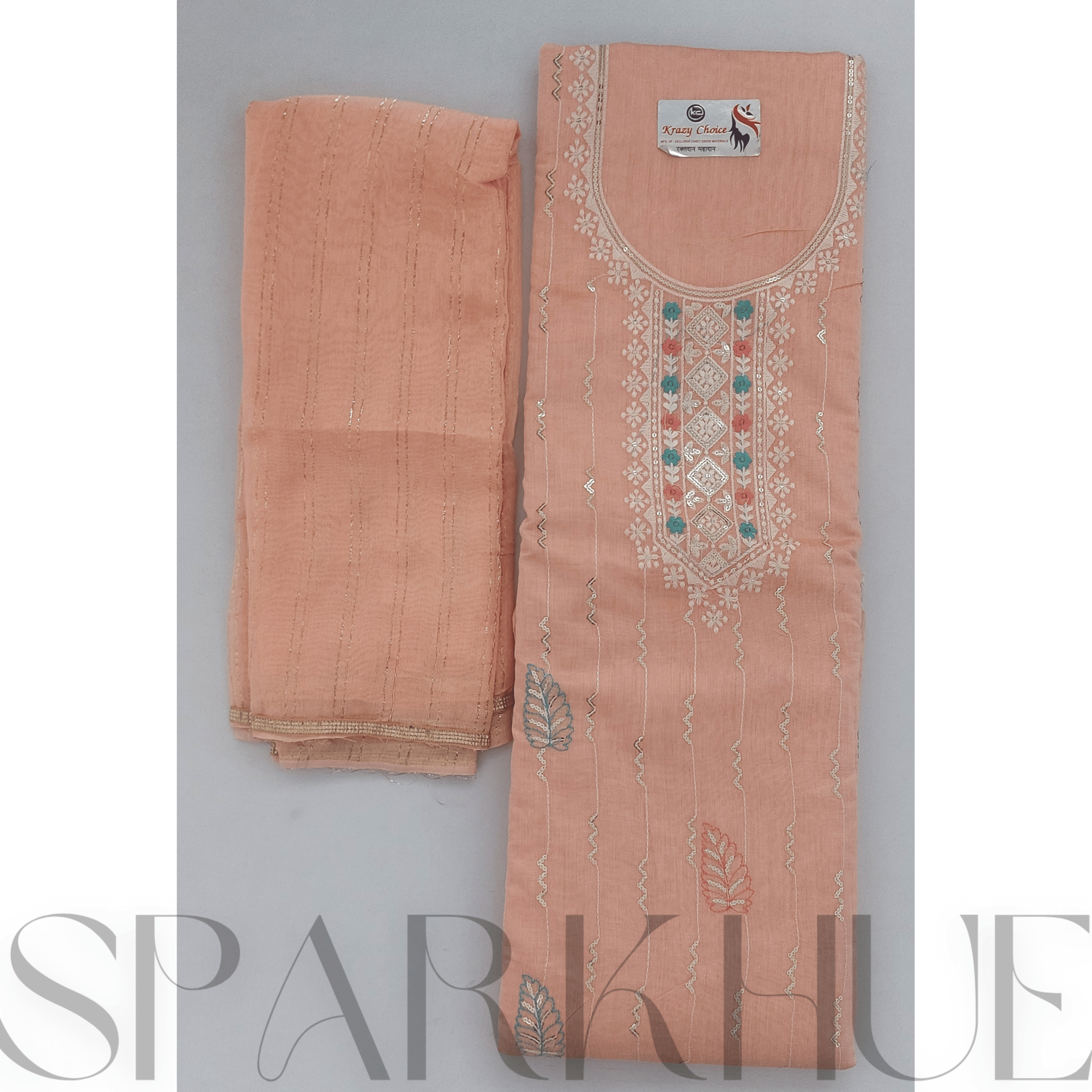   Unstitched embroidered peach kurta set
