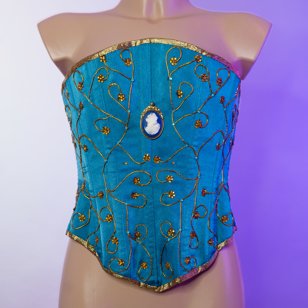 Corset azul detalles dorados