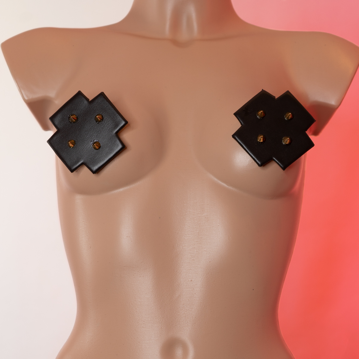 Pezoneras en cruz con pinchos