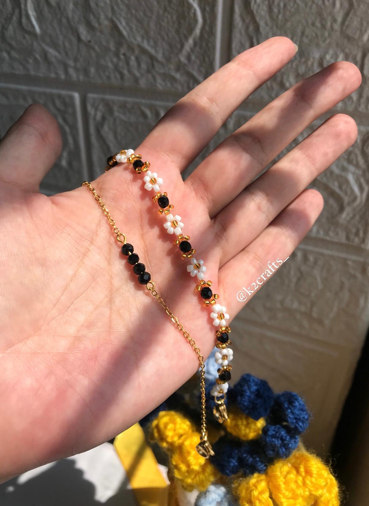 White Flower Black Bead Bracelet Pair