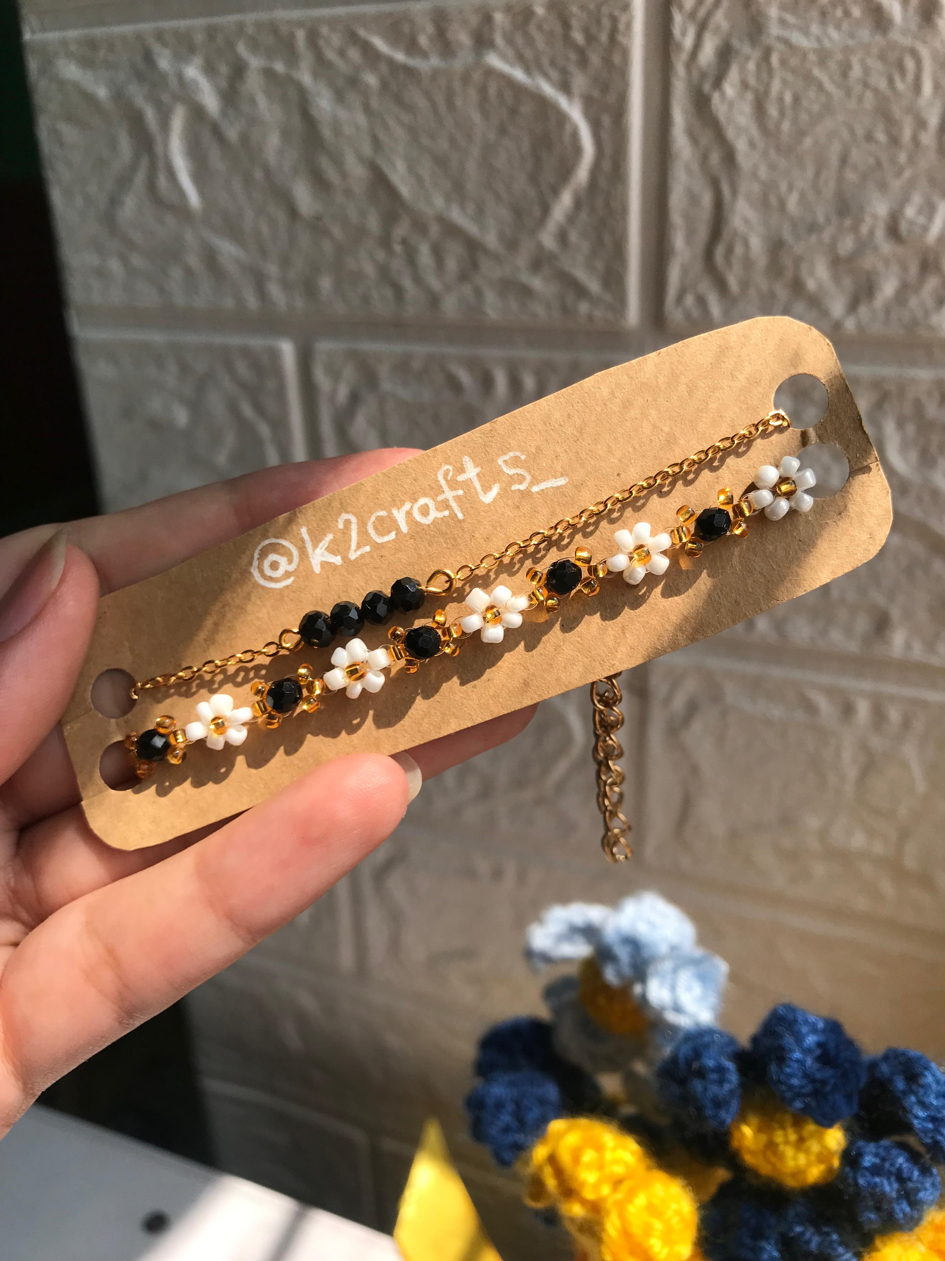 White Flower Black Bead Bracelet Pair