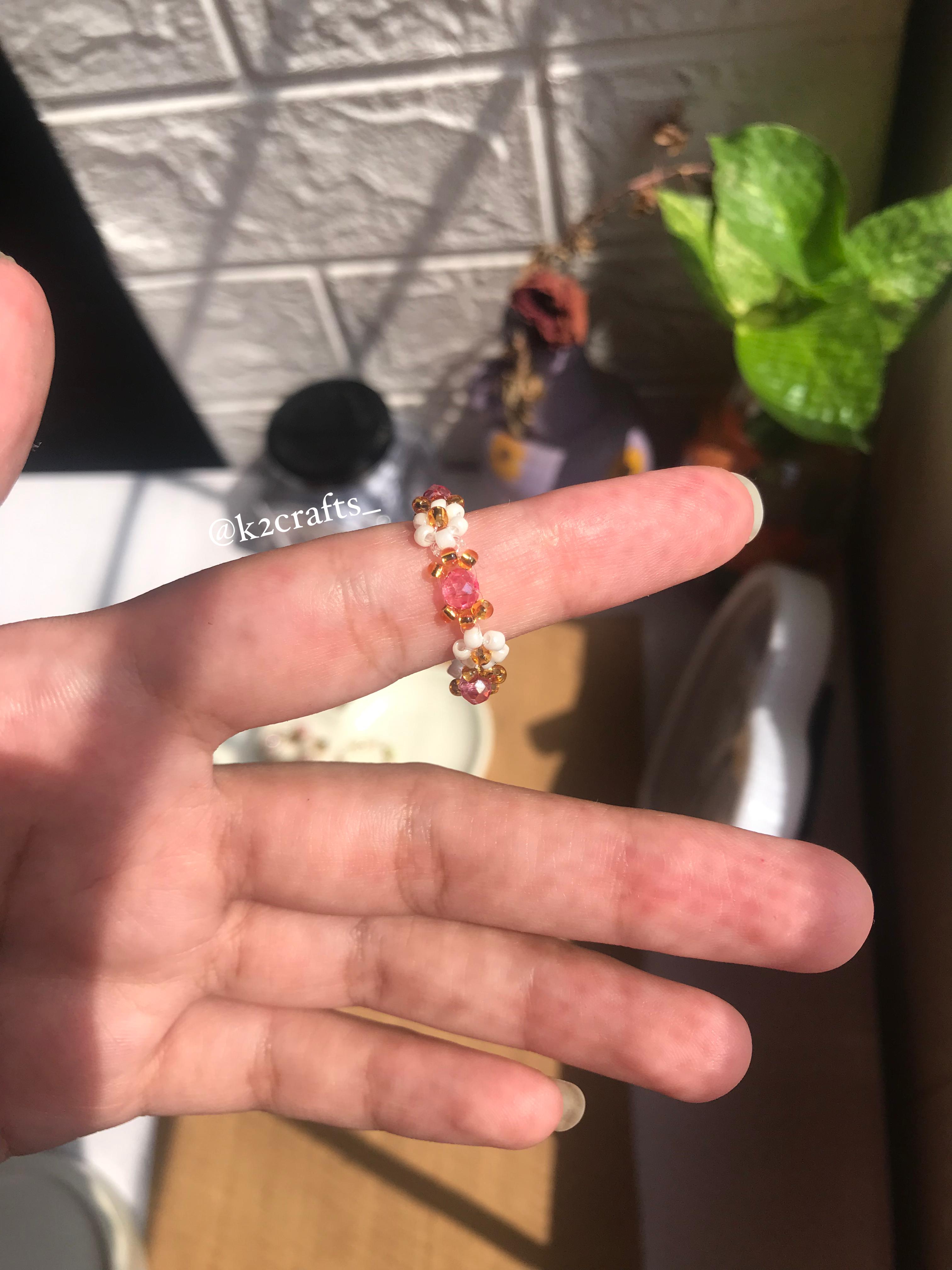 White daisy with crystal bead ring