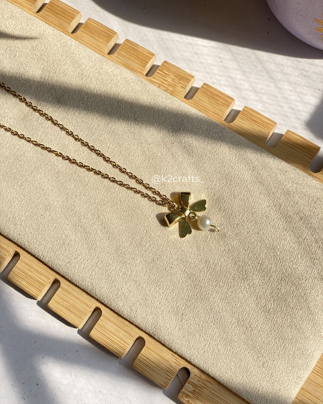 Bow Necklace with Pearl Drop