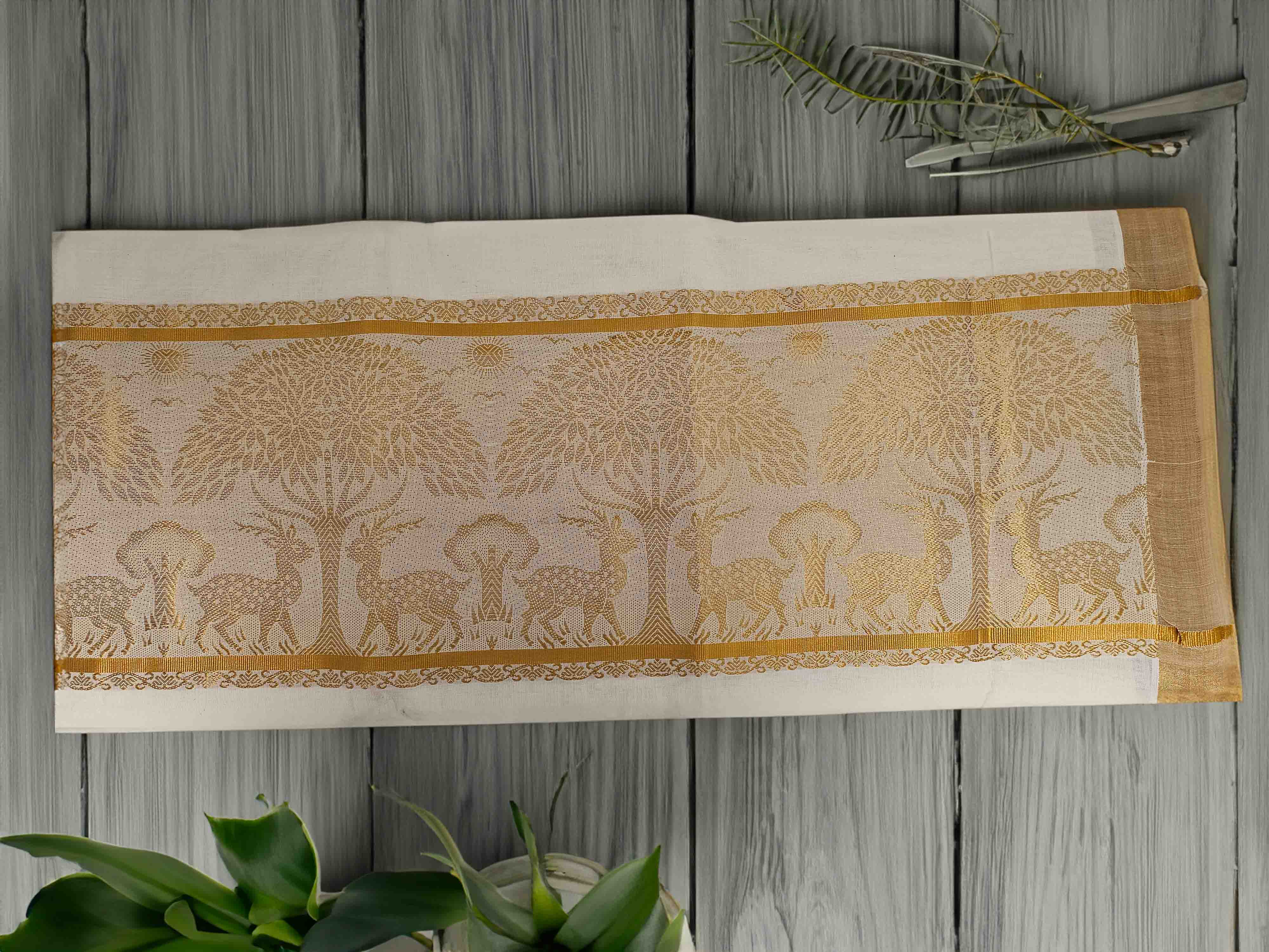 Golden kasavu tissue saree