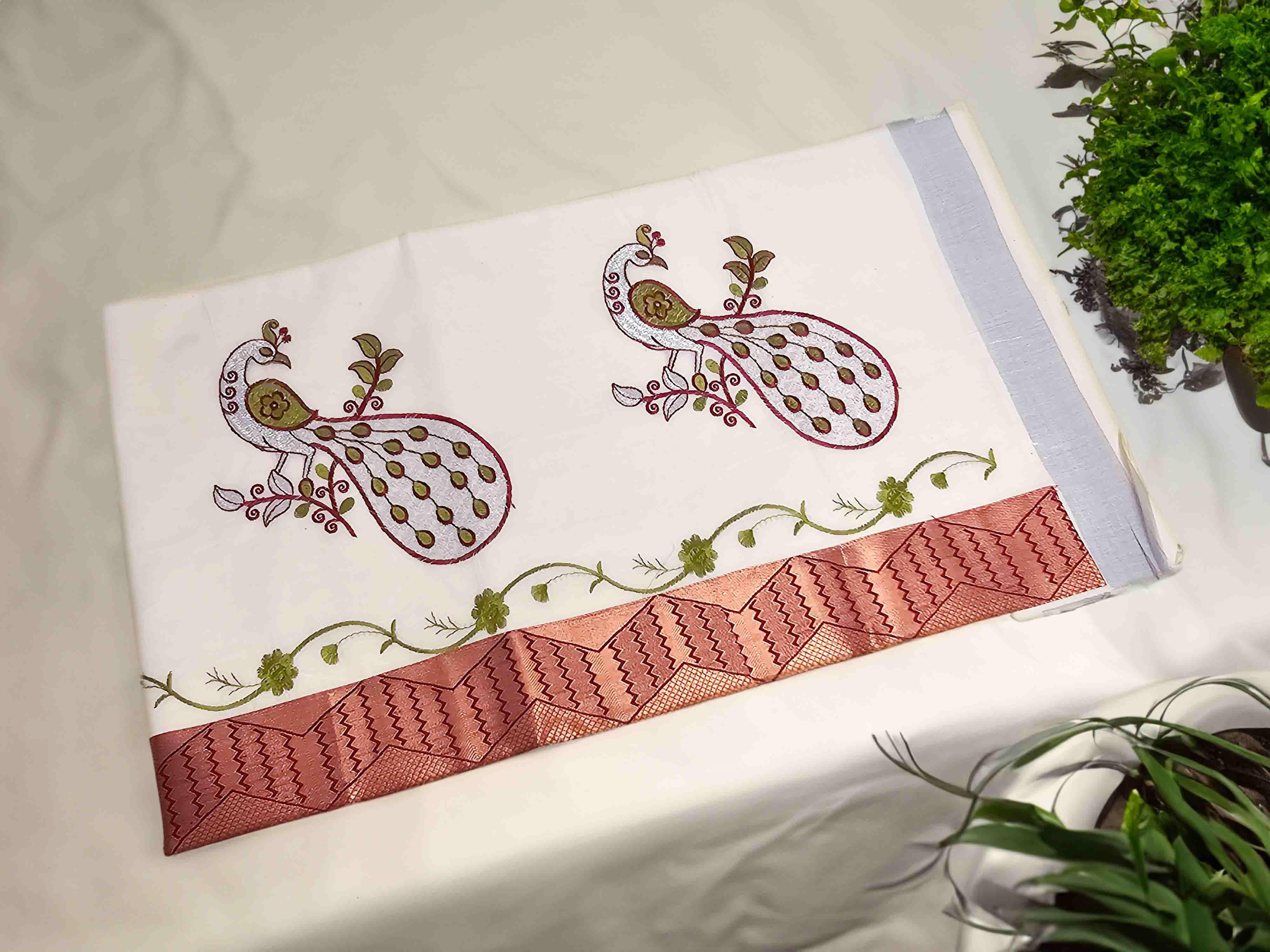 Embroidered kerala saree