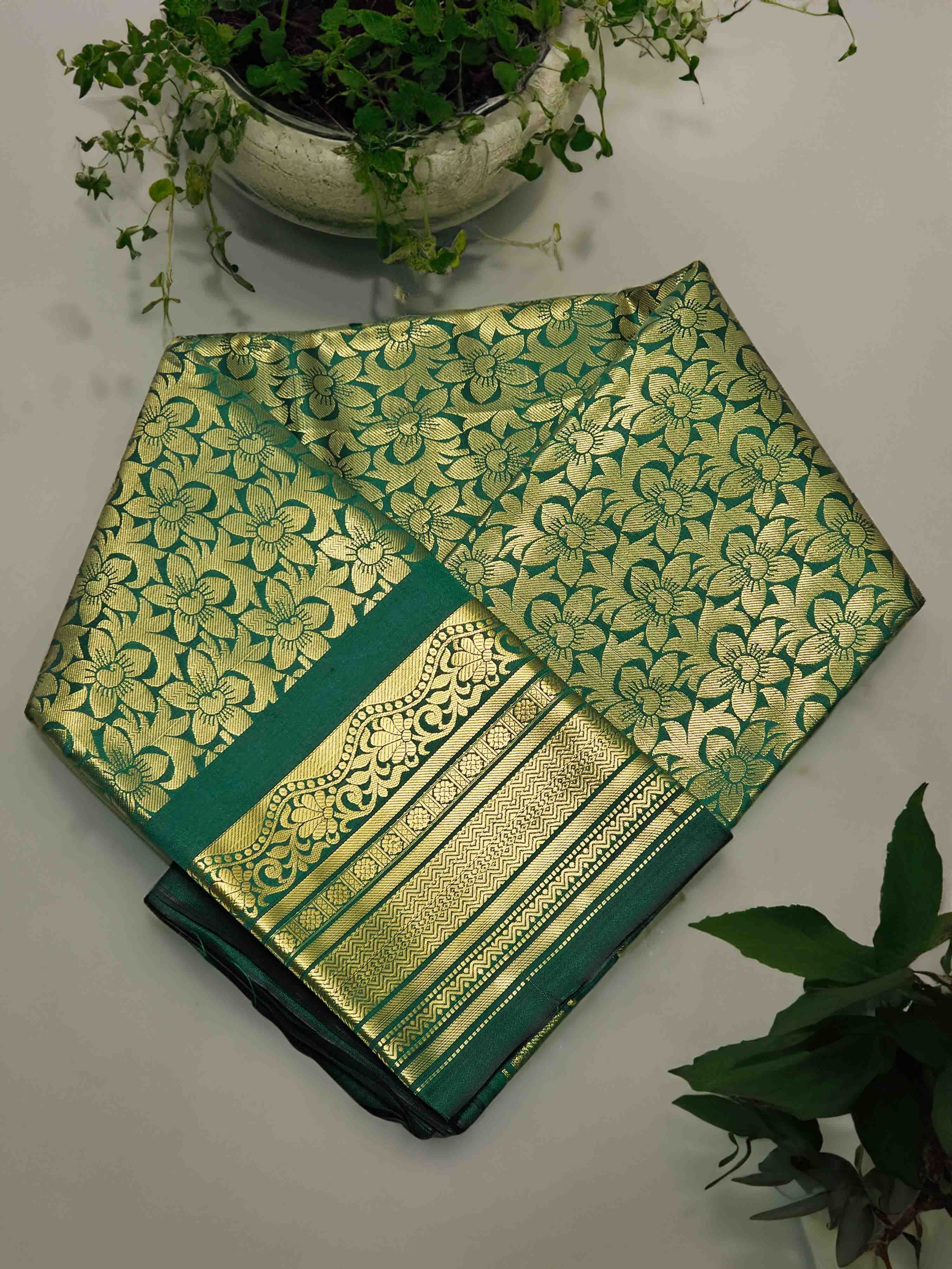 Green and gold floral silk saree