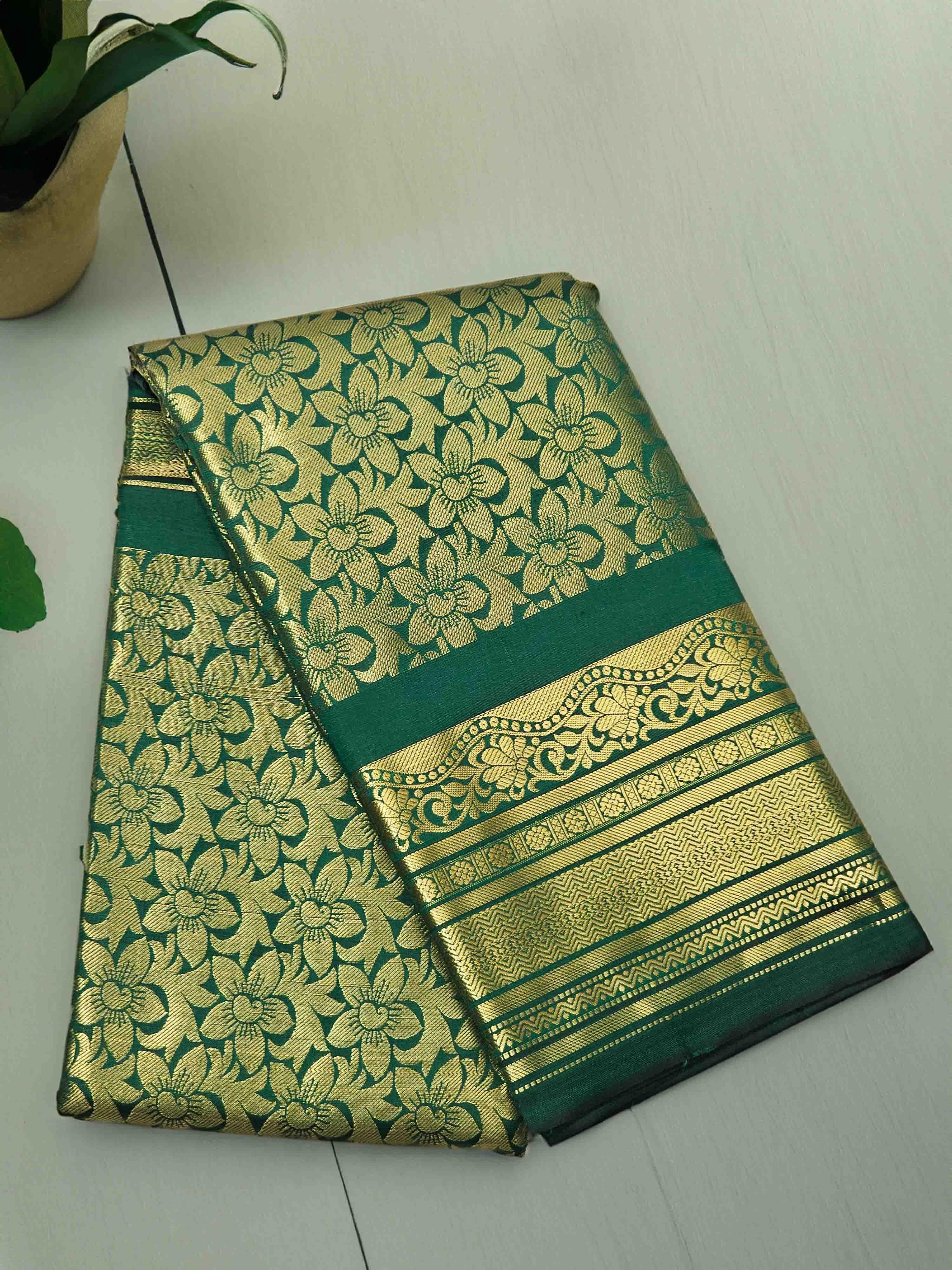 Green and gold floral silk saree