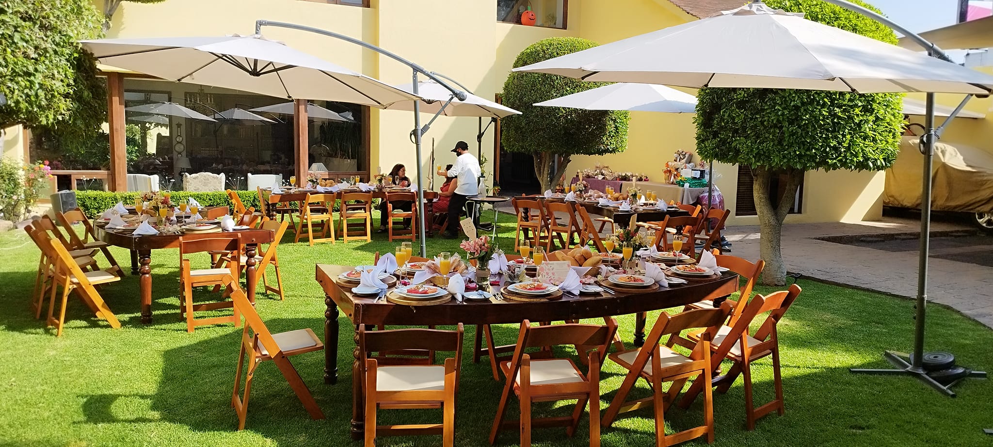 Sombrillas de brazo lateral para eventos de jardín