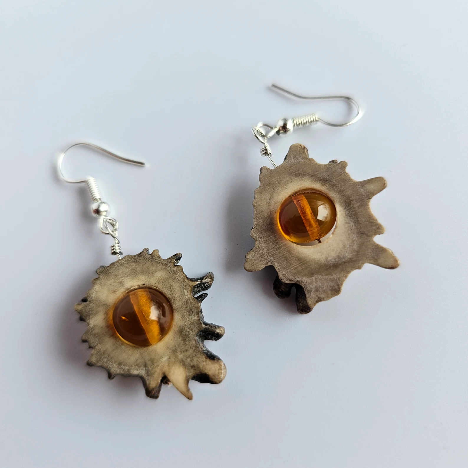 Deer antler earrings with amber