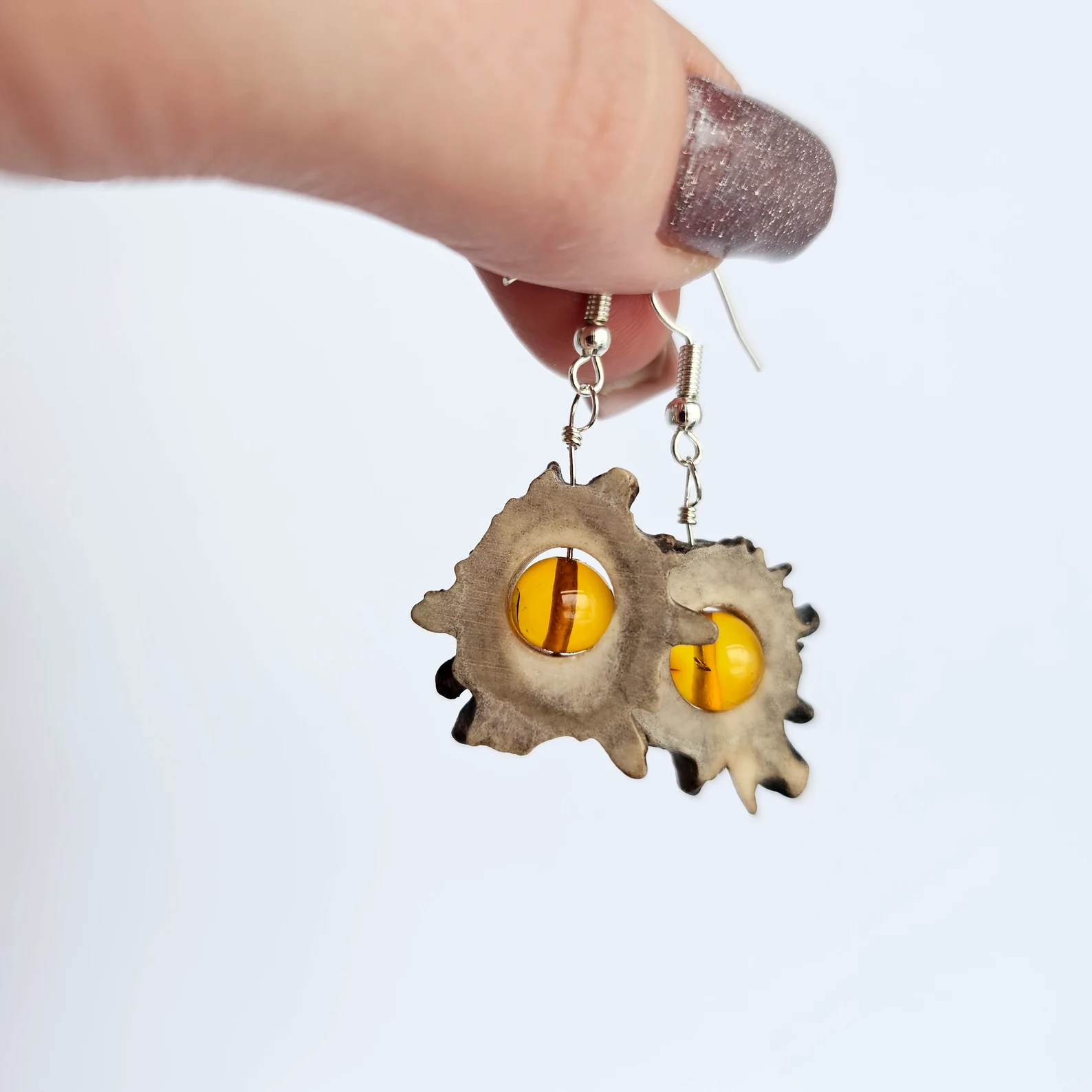 Deer antler earrings with amber