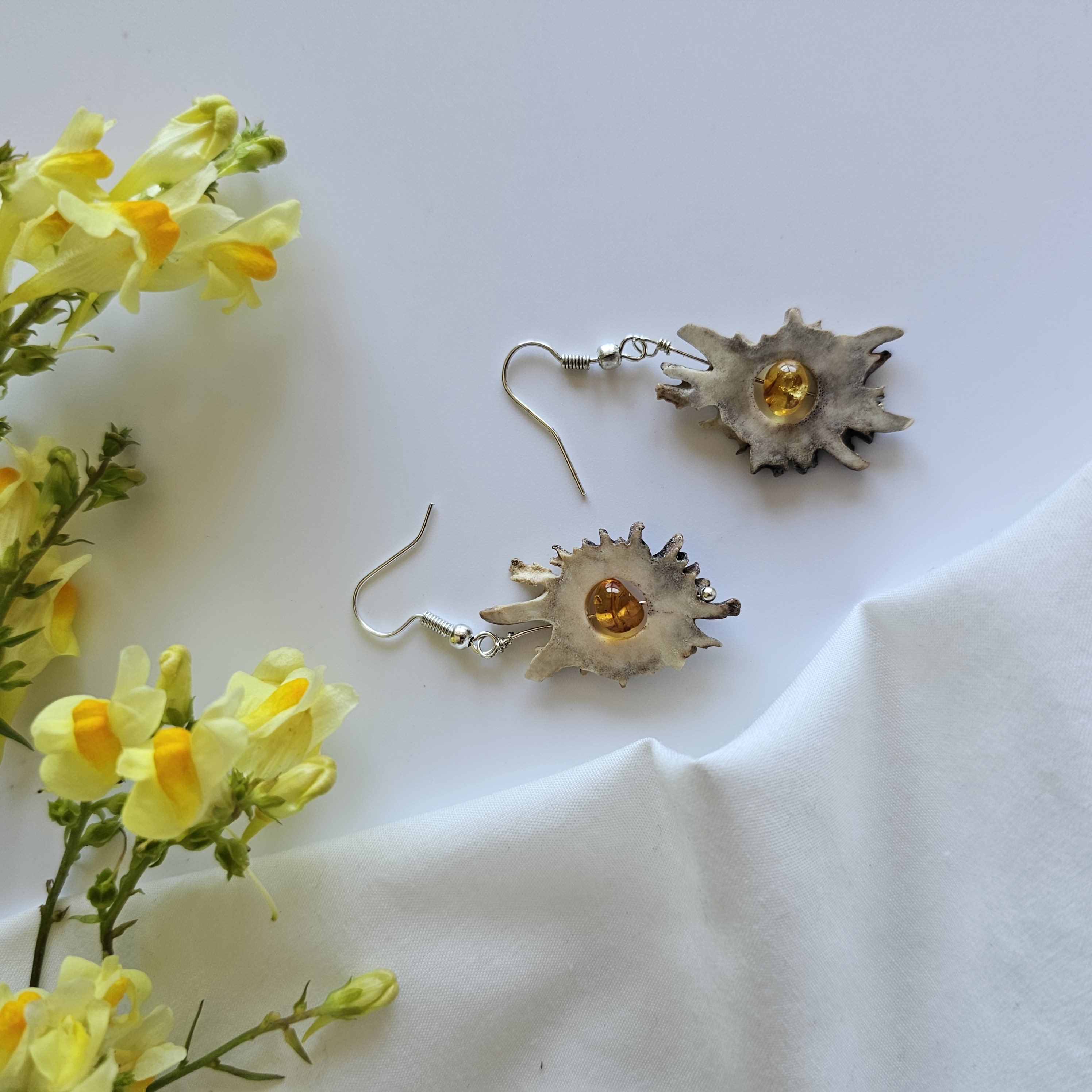 Deer antler earrings with amber
