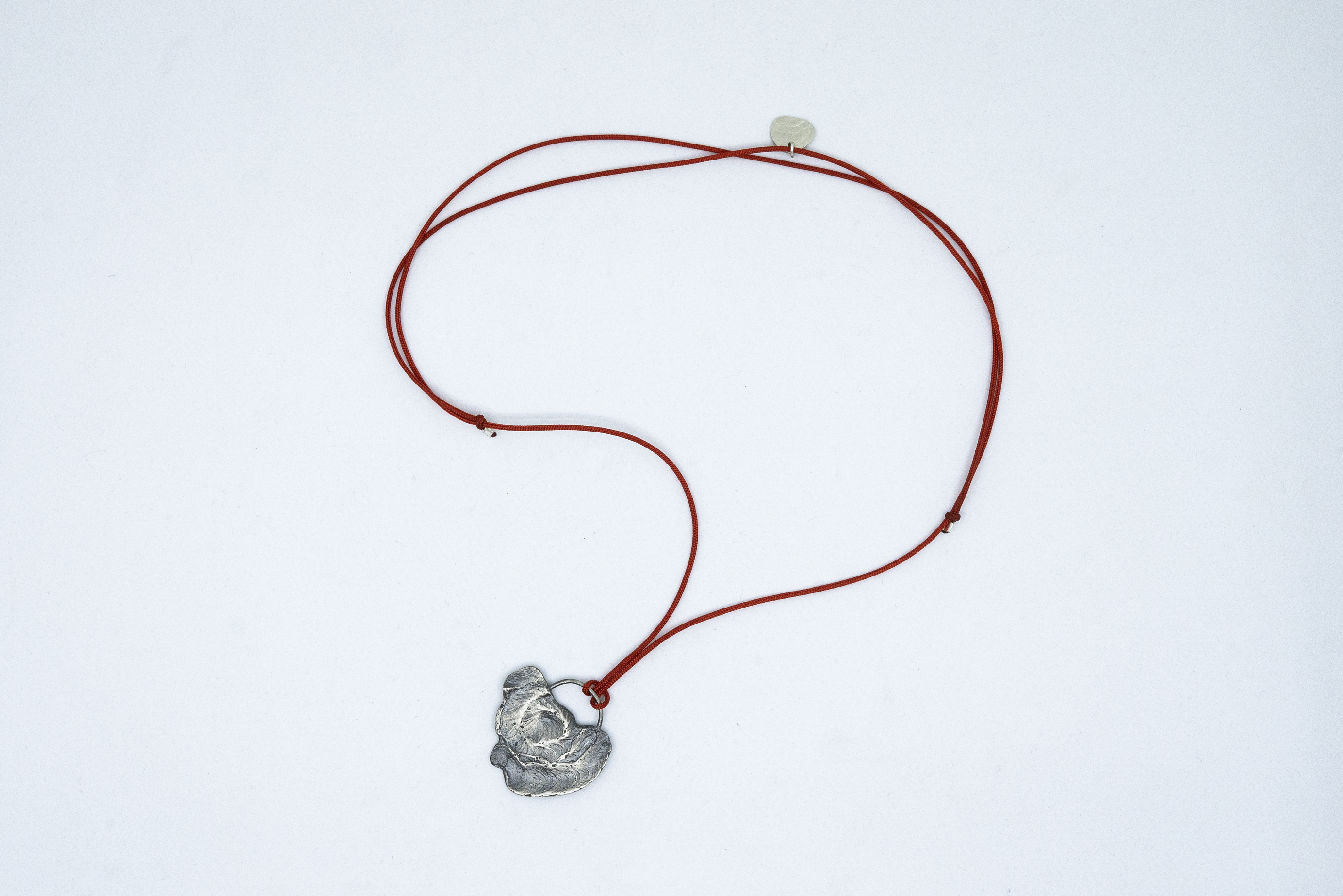 Colgante pieza redonda 