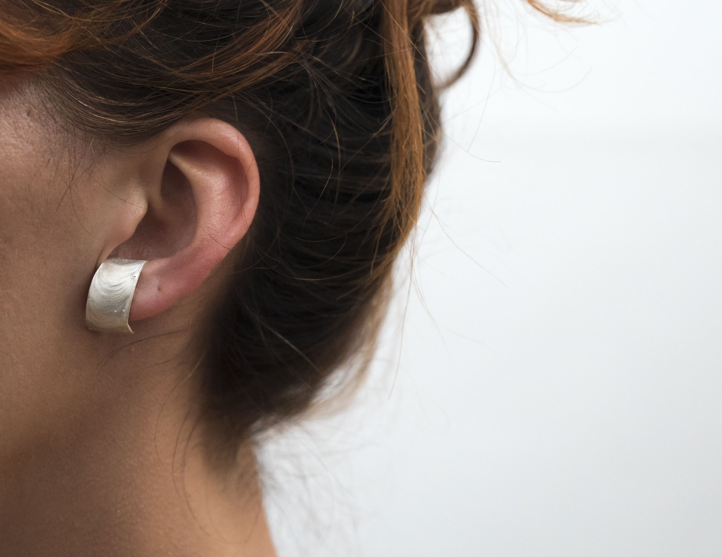 Pendientes dentro de oreja