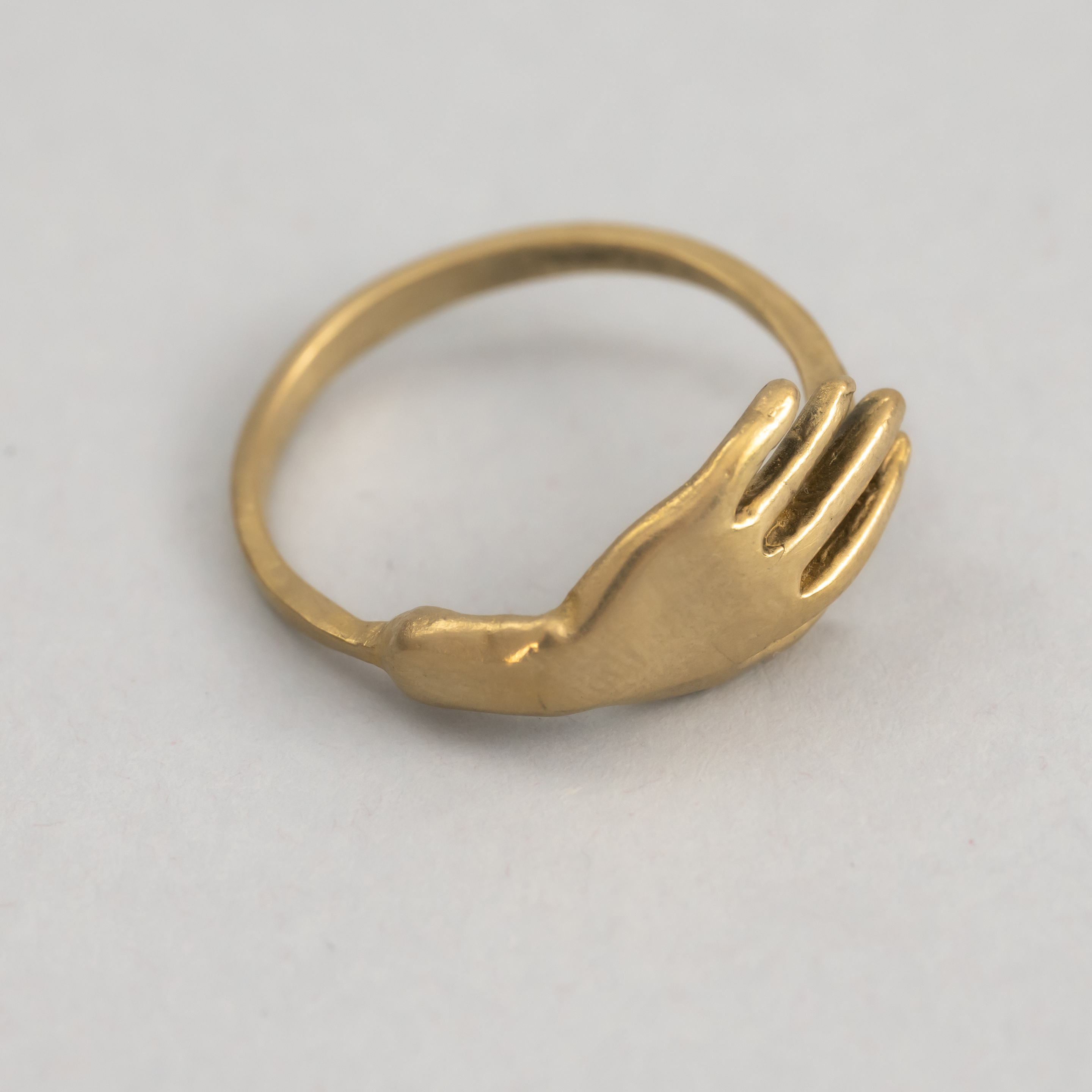 Anillo mano de latón