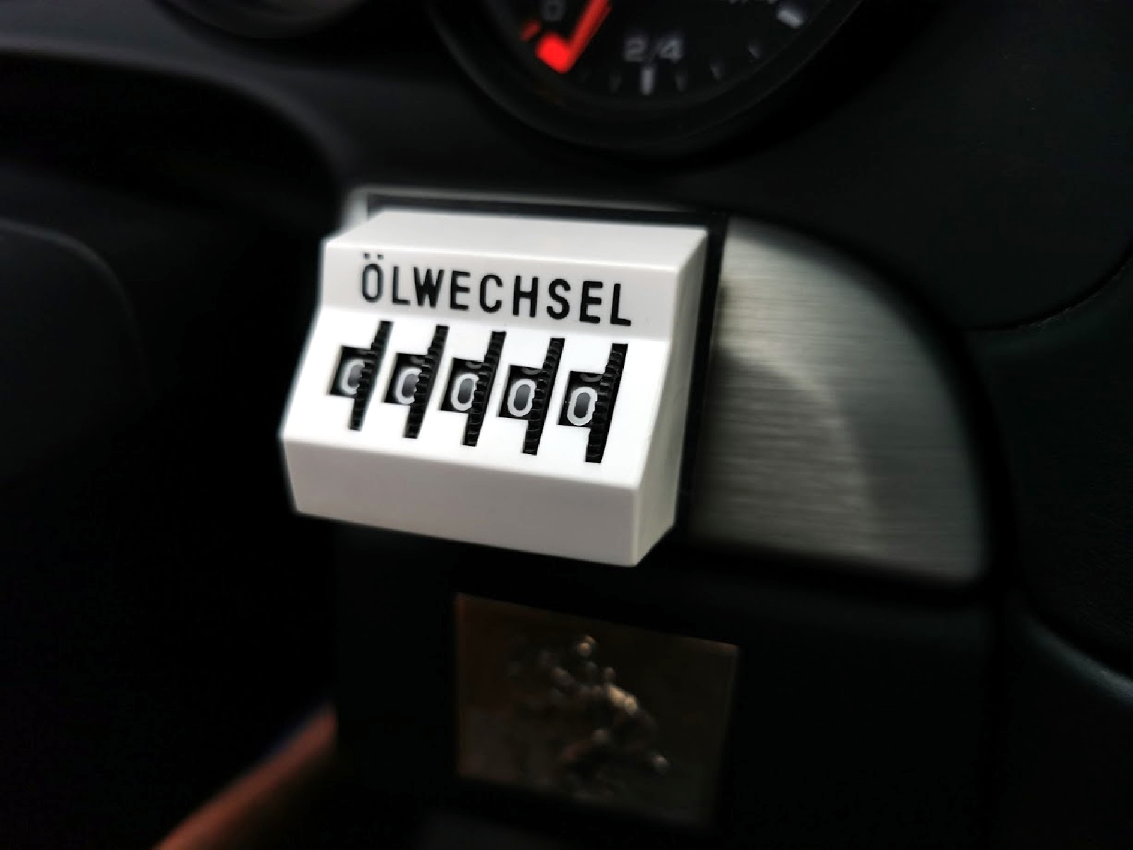 Mechanischer Kilometerzähler "Ölwechsel" mit Rändelrädchen