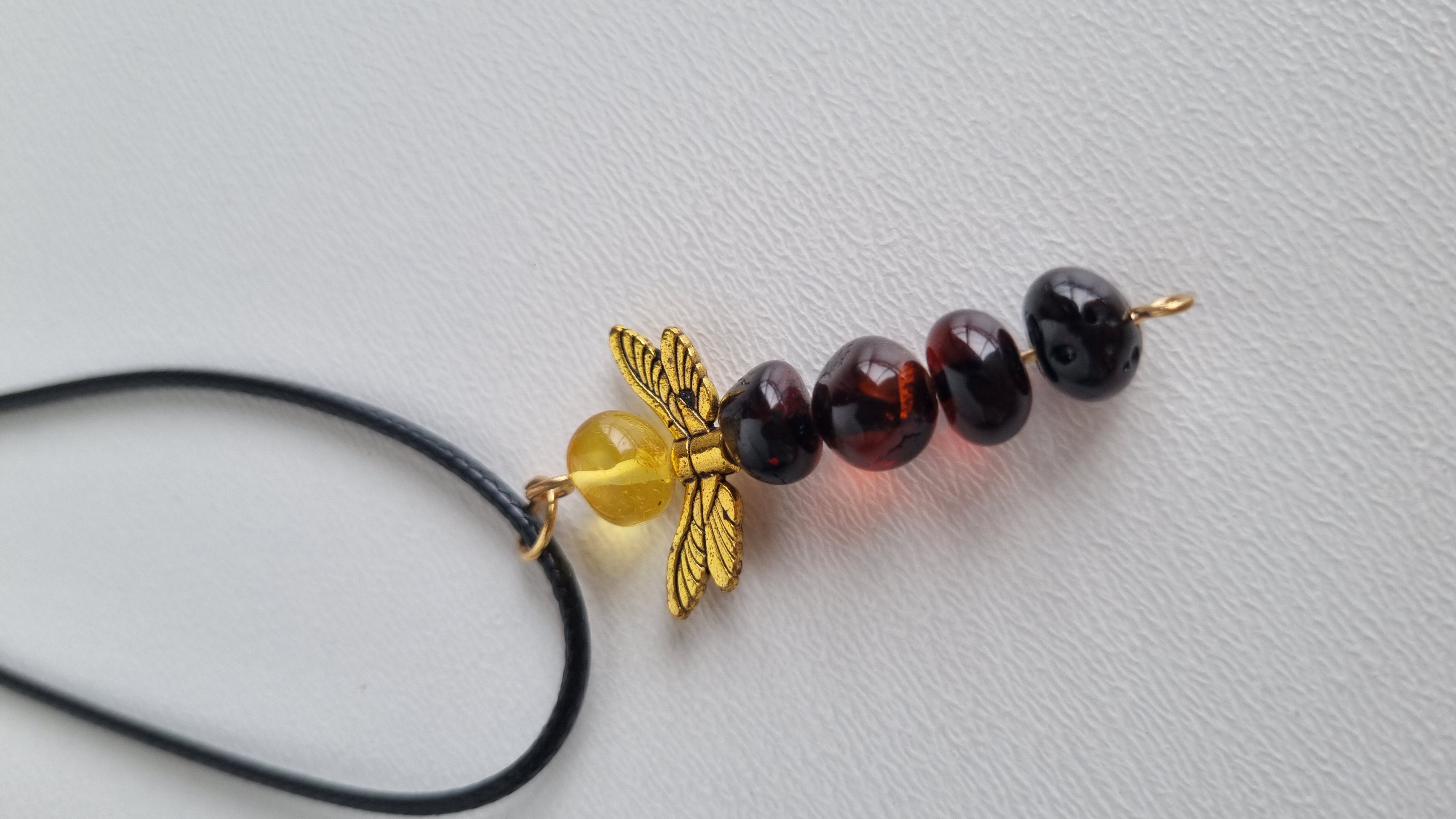 Gintarinis pakabukas "Angelas sargas"