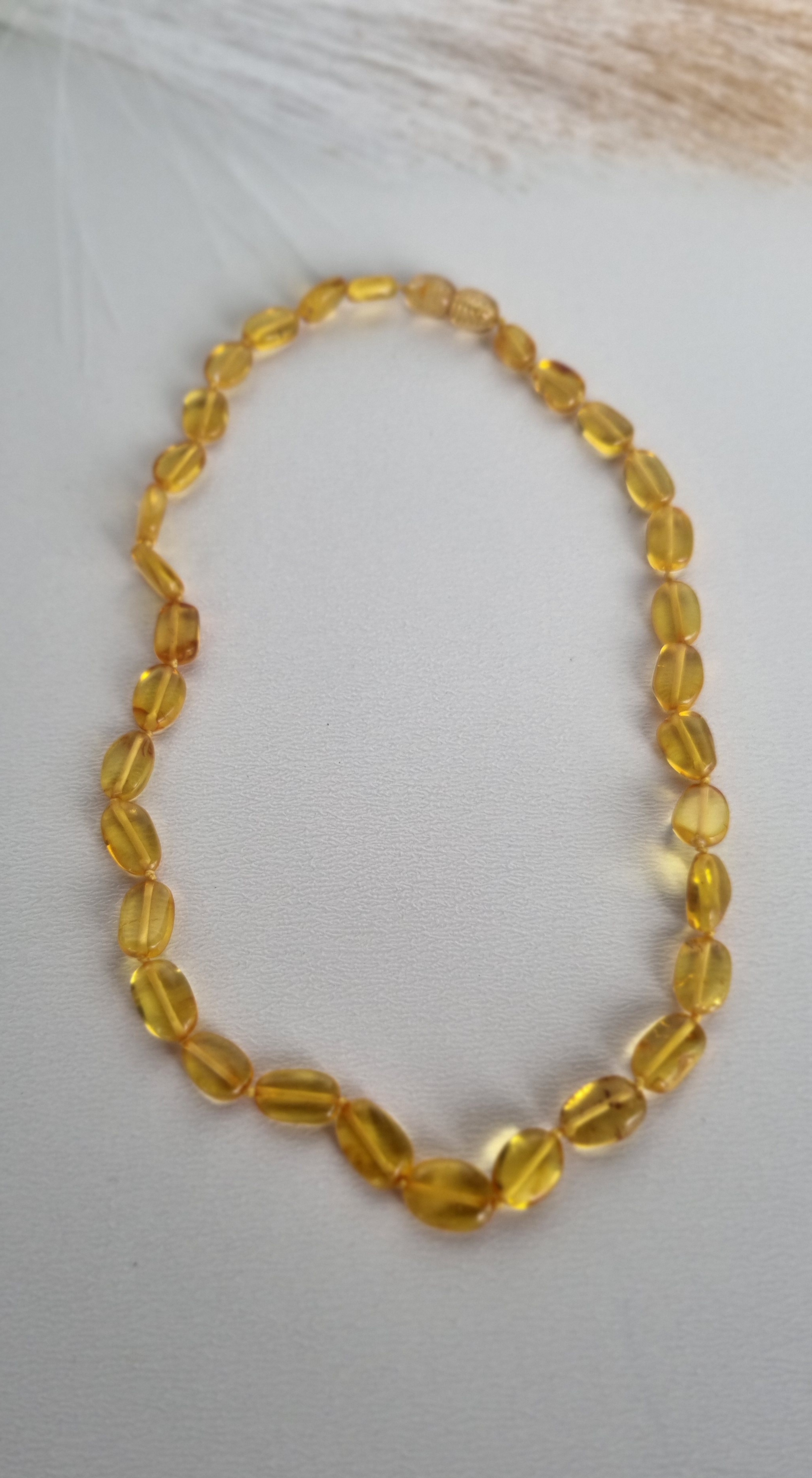 Ovalūs gintaro karoliai vaikams