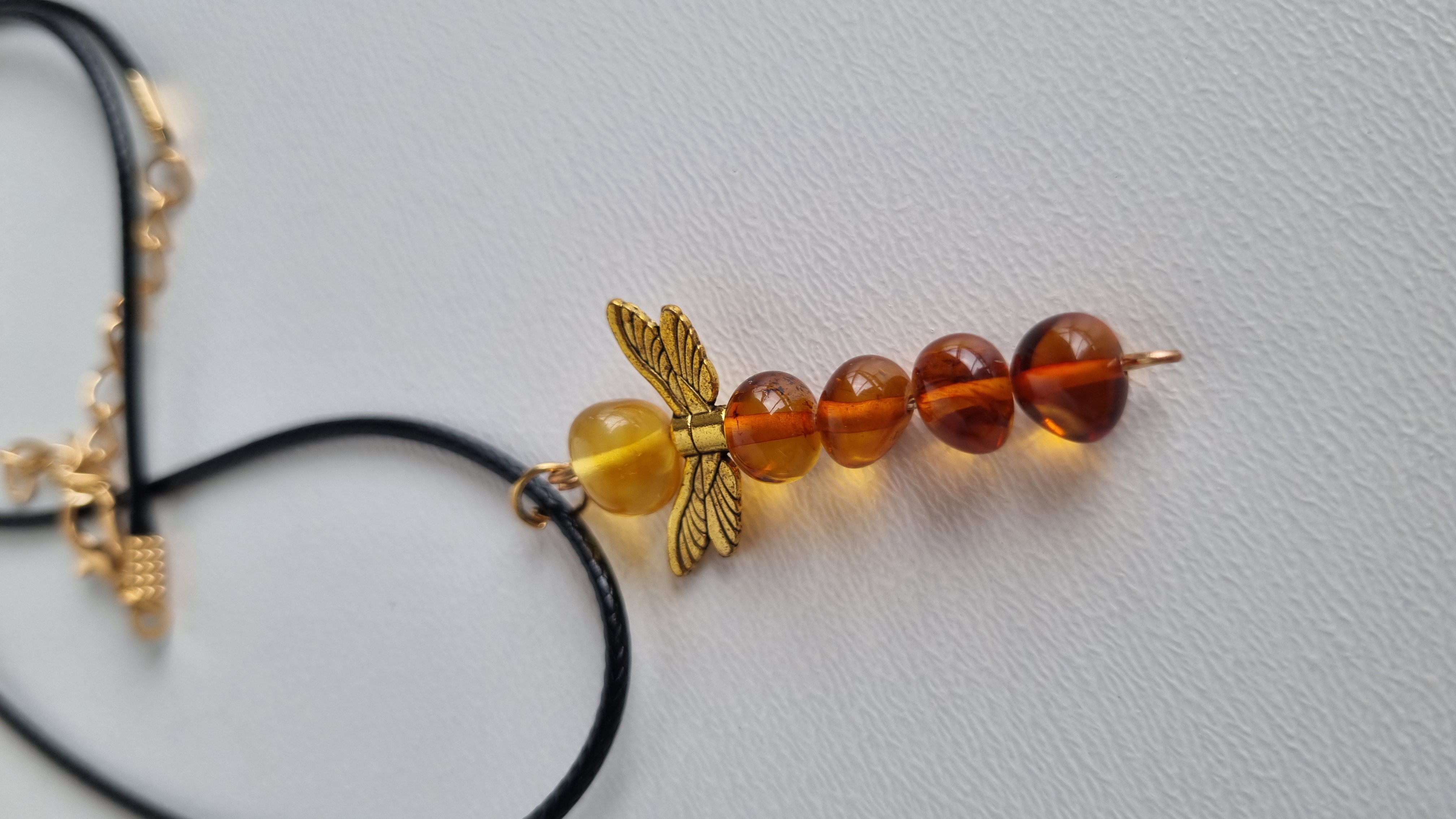Gintarinis pakabukas "Angelas sargas"