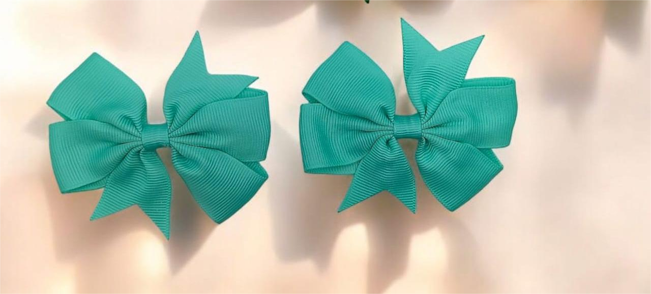 Lazos verdes para el cabello tipo pinza